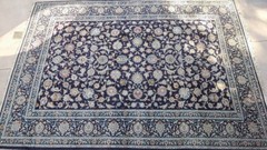 Kashaan design hand knotted wool rug in excellent condition