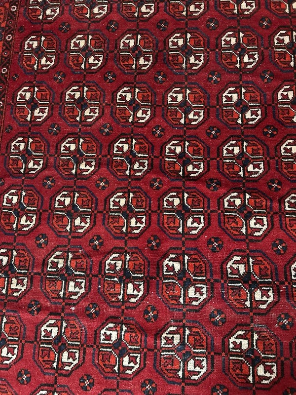Wool hand-knotted Turkmen rug with geometric patterns in red (4' x 6') gallery