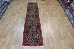 FINE HANDMADE ORIENTAL WOOL RUNNER WITN FINE WEAVE AND SUPERB COLOURS 245X50CM