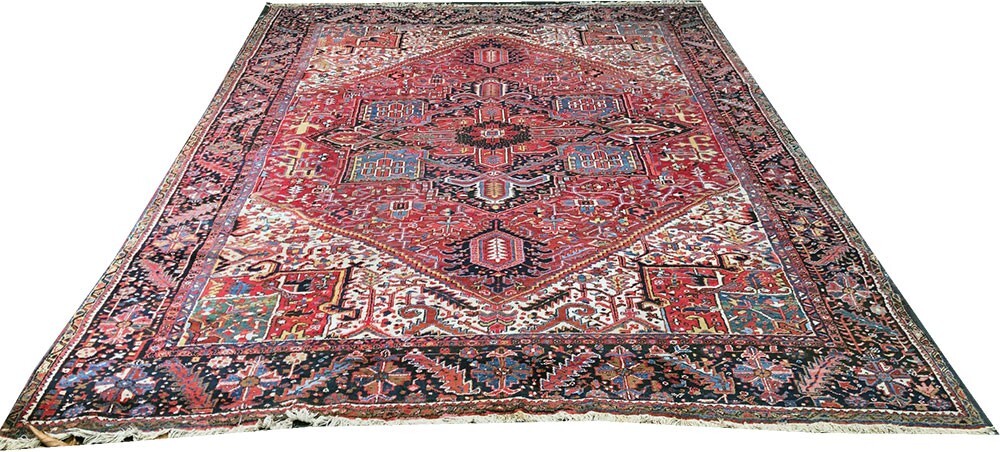 An Antique Decorative 10' x 13'- Herize Rug
