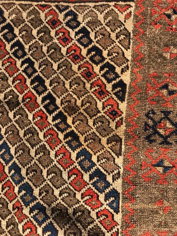 AN ATTRACTIVE IVORY BACKGROUND COLOR BALOOCH TRIBAL RUG gallery