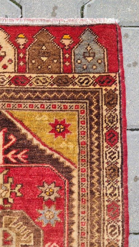Well Knotted One of a kind Antique Turkish rug gallery