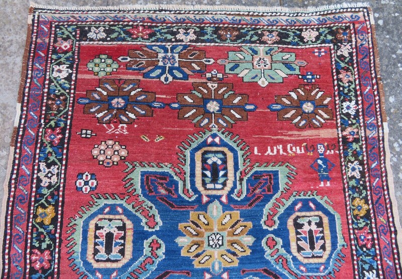 ANTIQUE CAUCASIAN KARABAGH VILLAGE RUG. SIGNED NAME BY WEAVER. 194CM X 117CM. gallery
