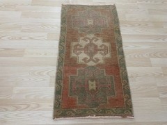 Faded Turkish Vintage Small Rug 1.4×2.7 ft Muted Geometric Medallion Design