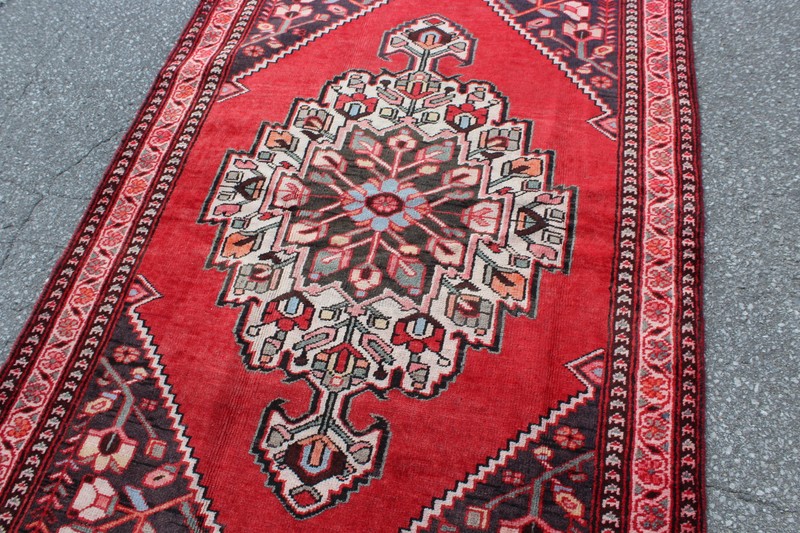 Bright Geometric Medallion Afghan 4' 2" x 6' 4" Red Hand Knotted Area Rug gallery