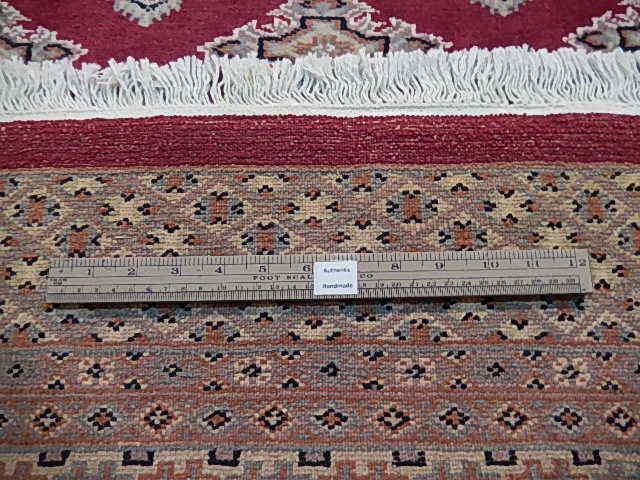4' 1'' x 6' 5'' Diamond-Shaped Handmade Courage Symbol Transitional Rug B-78155 gallery