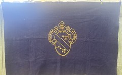 VINTAGE BLUE BLACK WOOL WALL HANGING RUG W GREEK WRITING & CREST 63”x39”