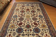 Handmade Wool rug. Beige Background, 6′ x 9′ red, blue, cream ivory Pm75