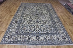 A very fine handmade oriental Keshan carpet with fine floral design 310 x 197 cm
