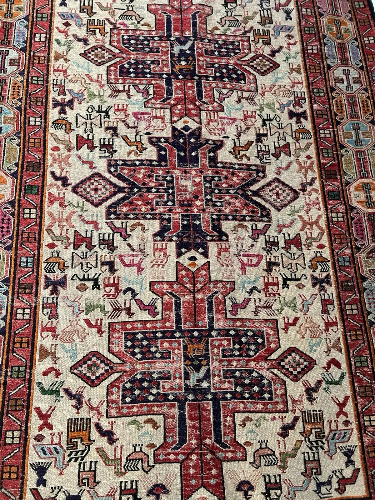 Hand-knotted wool rug with geometric medallion design gallery