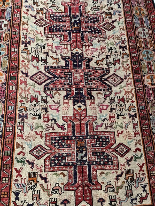Hand-knotted wool rug with geometric medallion design gallery