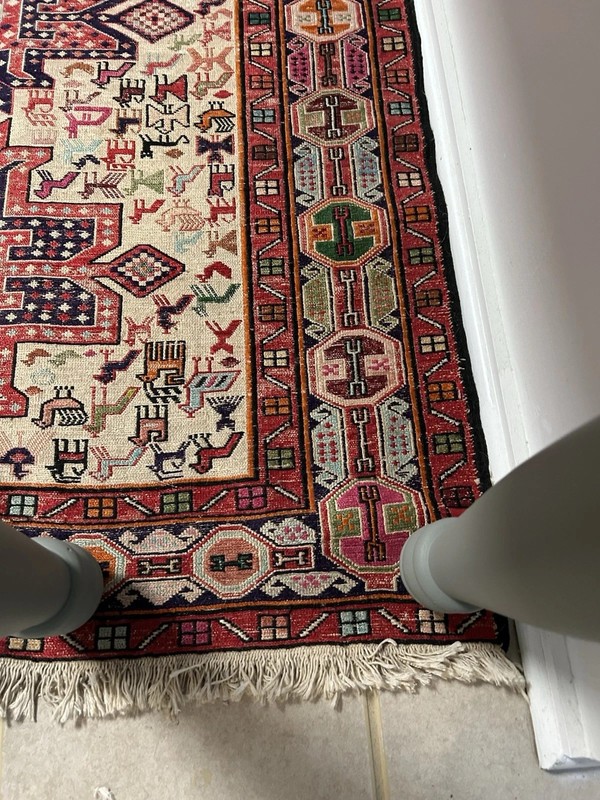 Hand-knotted wool rug with geometric medallion design gallery