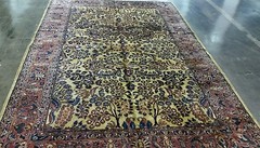 A REAR GOLD COLOR SARROOK RUG