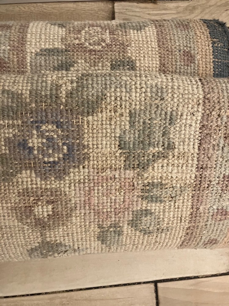 woolen rug 7x11 feet. Floral with Pastel blue, beige and blush rose pink. I
