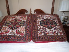 2 pieces of of nonidentical Rug Cushion Dark red background Multi Color.