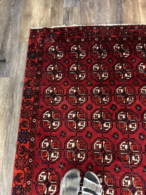 Wool hand-knotted Turkmen rug with geometric patterns in red (4' x 6') gallery