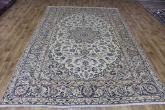 A good example of a Keshan carpet with fine floral design 300 x 197 cm