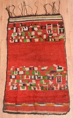 Vintage 1950s Moroccan Berber Rehamna rug. Abstract design, red background, wool