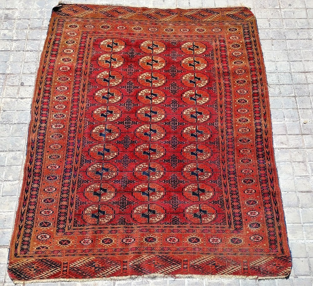 CARPET TEKKE. WOOL KNOTED BY HAND. TEKKE. TURKMENISTAN. XIX-XX CENTURY