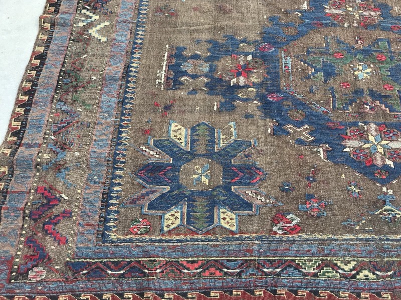 AN AWESOME ANTIQUE SUMAC RUG WITH EXCEPTIONAL DARK CAMEL HAIR BACKGROUND COLOR gallery