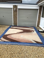 Cleaned woolmix rug 11ft x 9ft.Abstract swirl design.£100 o.no. Tel07858558673