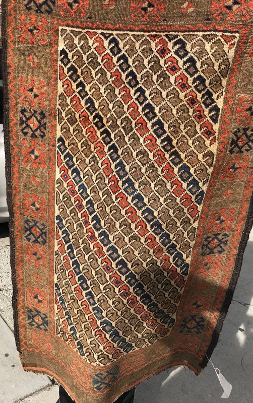 AN ATTRACTIVE IVORY BACKGROUND COLOR BALOOCH TRIBAL RUG gallery