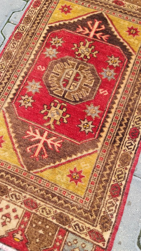 Well Knotted One of a kind Antique Turkish rug gallery