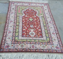 A SILK KASARIE RUG