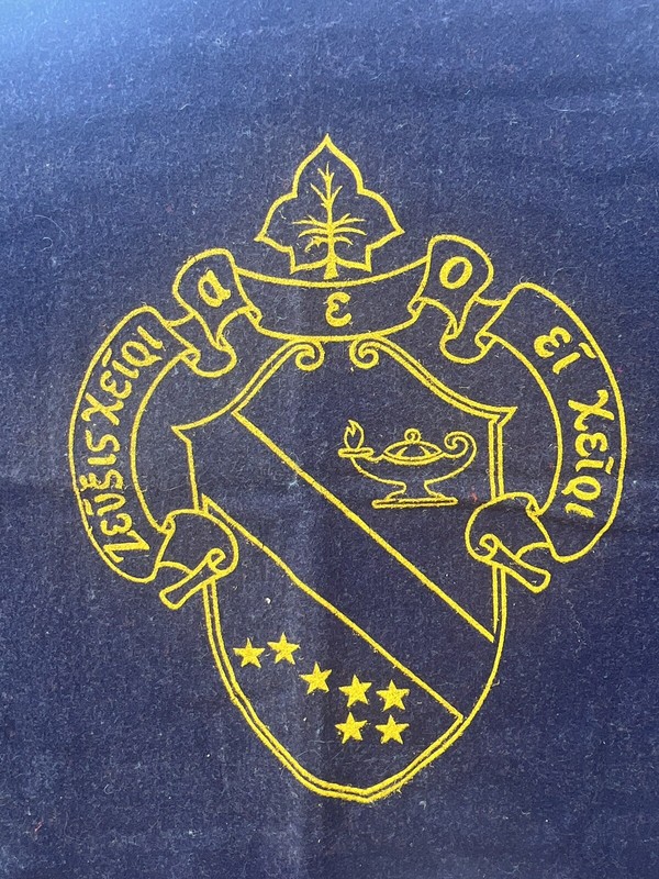 VINTAGE BLUE BLACK WOOL WALL HANGING RUG W GREEK WRITING & CREST 63”x39” gallery