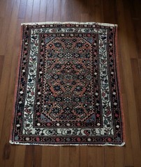 Handmade Antique Wool Rug With Geometric Medallion Pattern.
